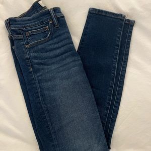 8" toothpick jean in medium blue distressed wash